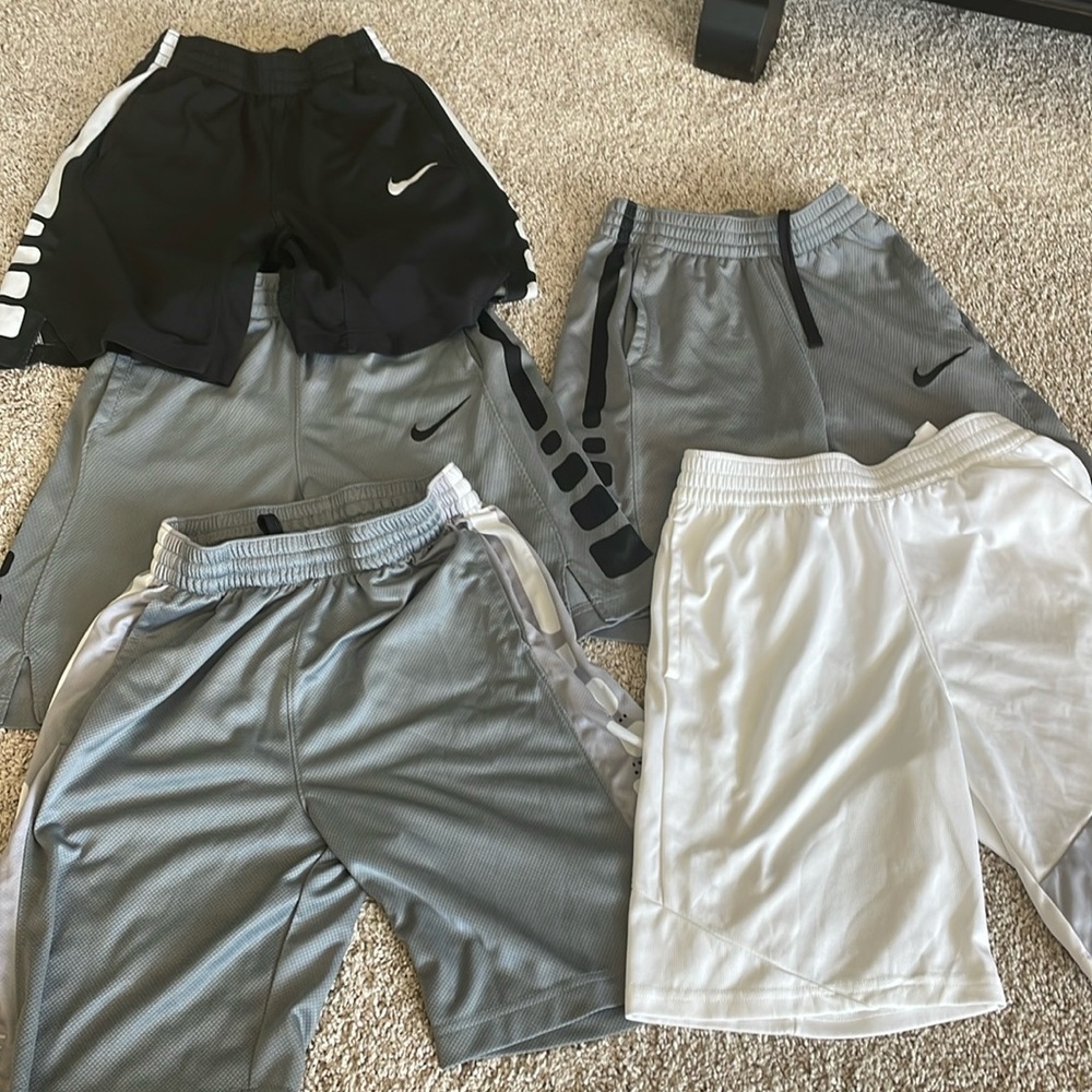 Five pairs of Nike dri-fit. Kids